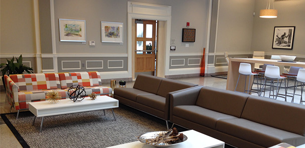 Common space with multiple seating areas.